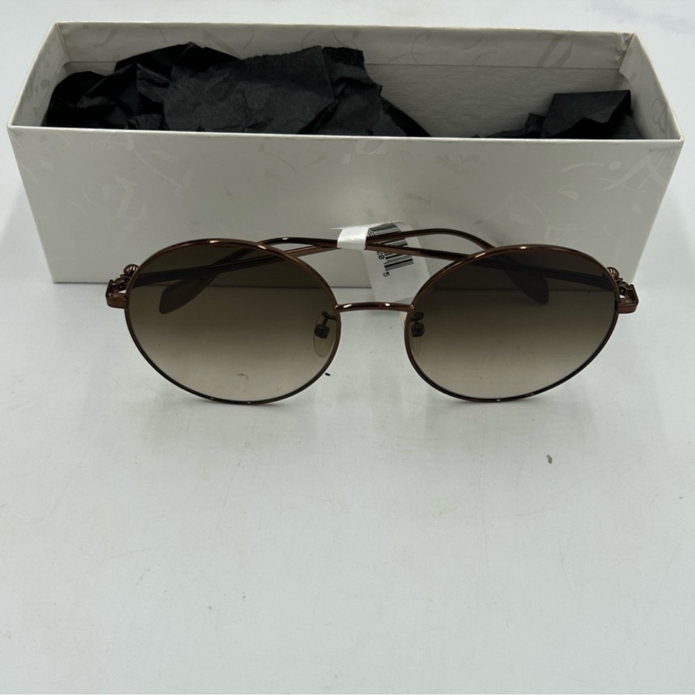 Women’s Alexander McQueen round sunglasses made in Italy